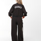 Women’s Black Two-Piece Tracksuit with White Side Stripes – Sporty & Casual Set