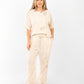 beige suit rose