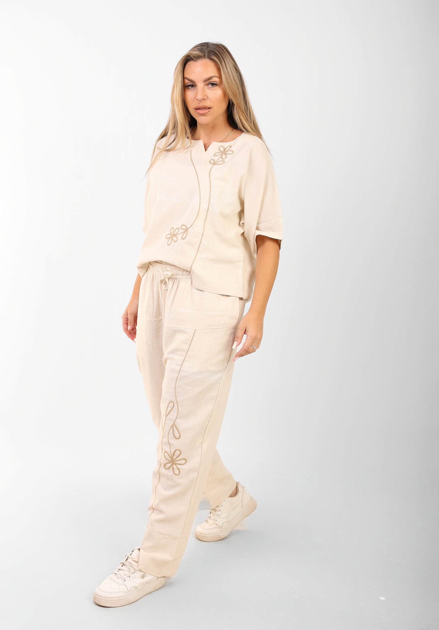 beige suit rose