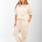 beige suit rose