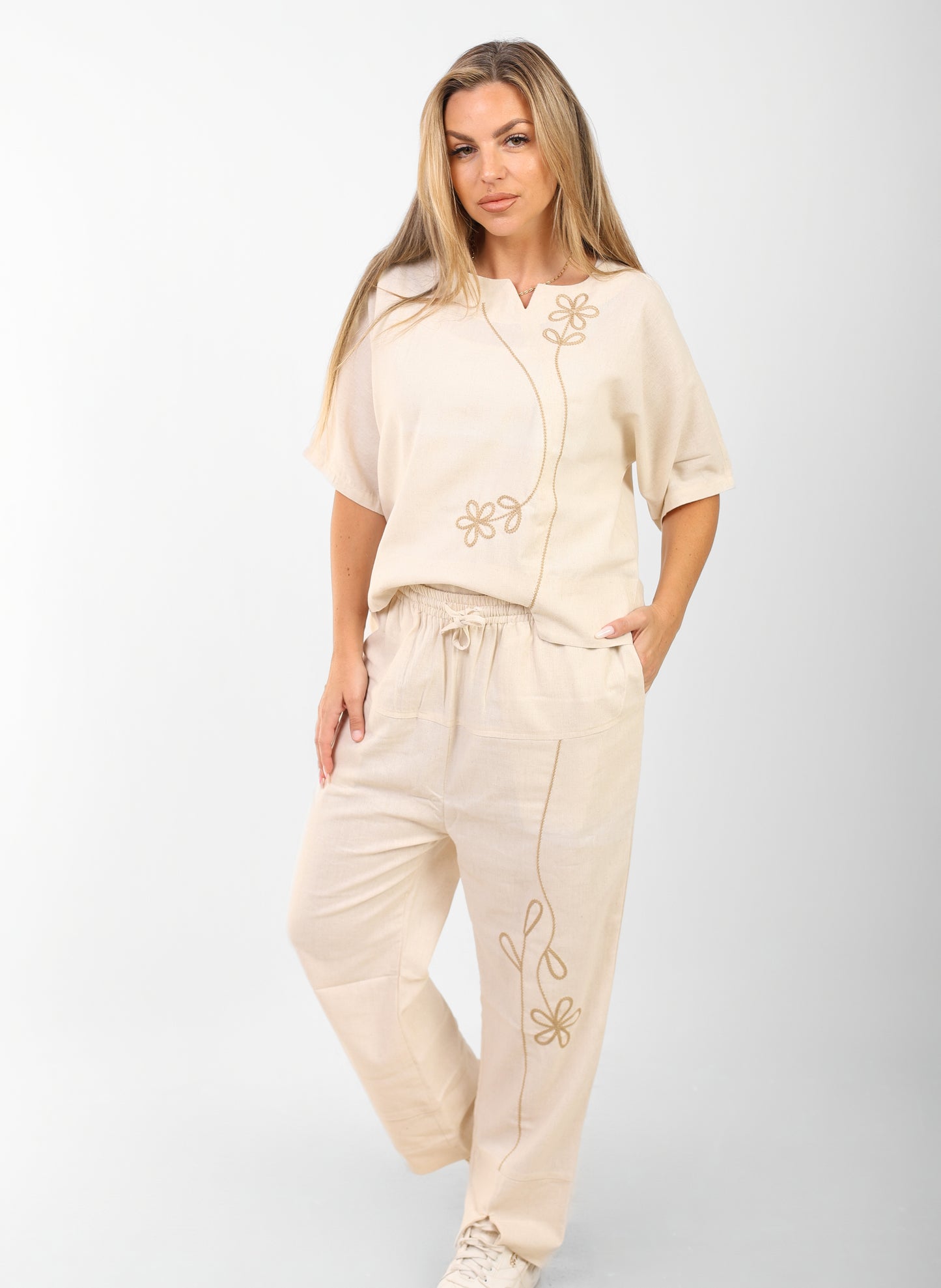 beige suit rose